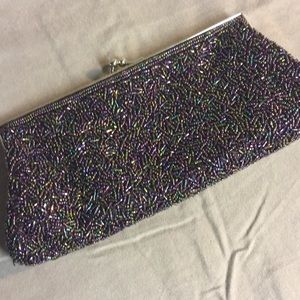 Irredentist purple clutch